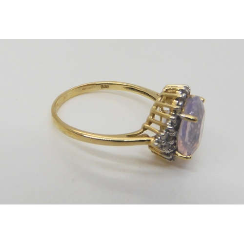 680 - A 9ct gold purple sapphire band ring, size P1/2, together with a (ct yellow gold lavender quartz and... 