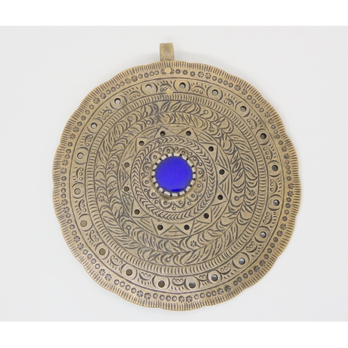 688 - A large ethnic plaid brooch, possibly Mexican, set with a blue glass rondel