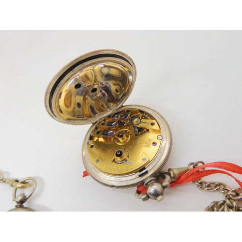 690 - A continental silver Turkish pocket watch stamped 800, the mechanism stamped Billodes, together with... 