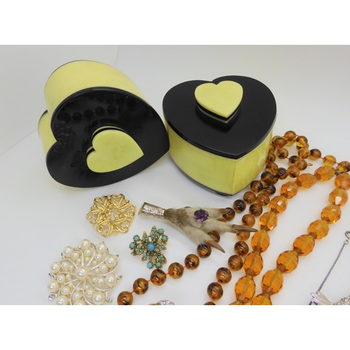 692 - Two retro acrylic pots with heart motifs, and a collection of vintage costume jewellery