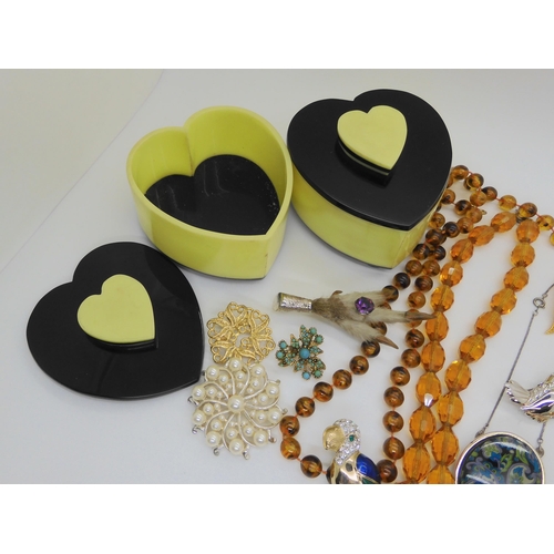 692 - Two retro acrylic pots with heart motifs, and a collection of vintage costume jewellery