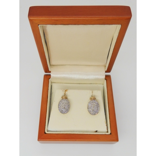 554 - A pair of pave diamond earrings (af) weight 2.5gms