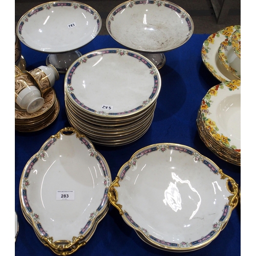 283 - A Bernardaud & Co, Limoges dessert service comprising two tazzas, eleven plates, two round dishe... 