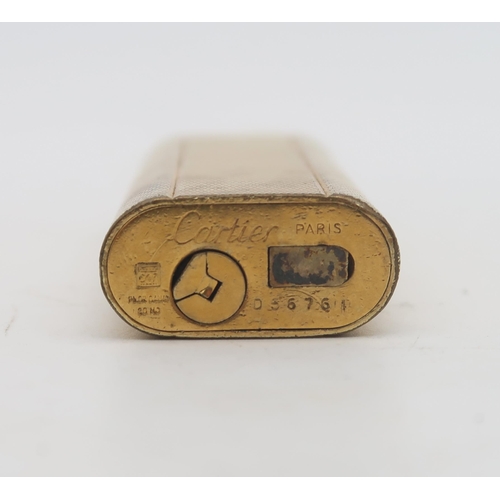 467 - A Cartier Plaque d'Or gold-plated cigarette lighter