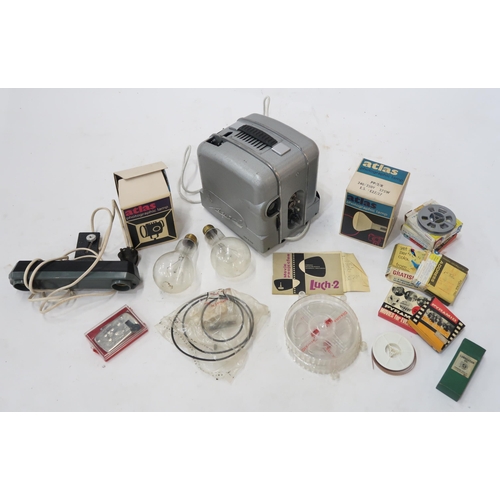510 - A Soviet Luch-2 movie projector, in original packaging and with a range of accessories; a photograph... 