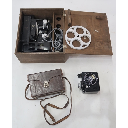 511 - A cased Eumig cine projector, together with a leather-cased Eumig cine-camera