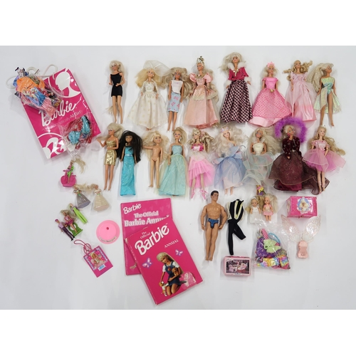 516 - A quantity of 1990s-era Barbies, together with various costume and accessories, annuals etc. 