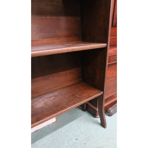 1 - A 20th century stained oak folding four shelf open bookcase, 140cm high x 66cm wide x 30cm deep