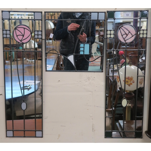 102 - A pair of 20th century ACD glass art leaded glass Rennie Mackintosh style wall mirrors, 76cm high x ... 