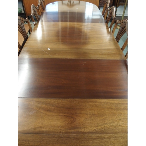 107 - A large 20th century reproduction mahogany triple pedestal dining table with two leaves, 76cm high x... 