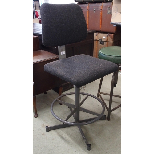 121 - A 20th century adjustable machinists stool with upholstered back and seat and another machinists sto... 