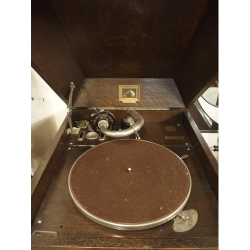 132 - A lot of three assorted portable gramophones to include, His masters voice, Unitone and Dansette (3)