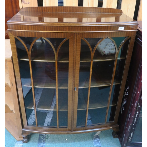 71 - A 20th century mahogany astragal glazed two door bookcase on ball and claw supports, 124cm high x 92... 