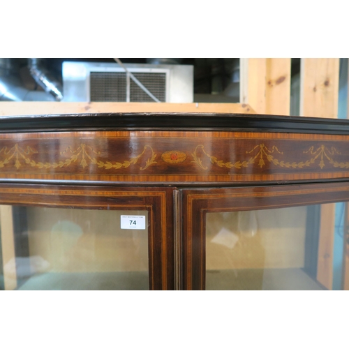 74 - A Victorian mahogany and satinwood inlaid serpentine front two door glazed display case on square ou... 