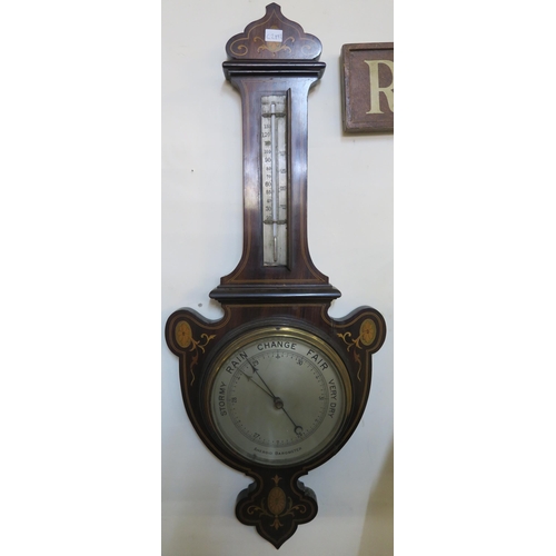 75 - A Victorian mahogany and satinwood inlaid barometer (def), gilt framed wall mirror,a mahogany standa... 