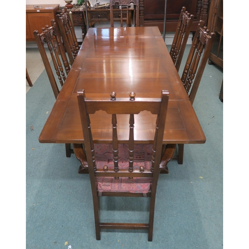 92 - A mid 20th century Ercol elm and beech extending dining table and six chairs, dining table, 74cm hig... 