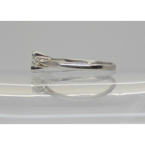715 - An 18ct white gold princess cut and brilliant cut three stone diamond ring. Set with an estimated ap... 