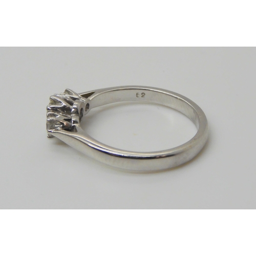 729 - An 18ct white gold classic three stone diamond ring, set with estimated approx 0.40cts combined, fin... 