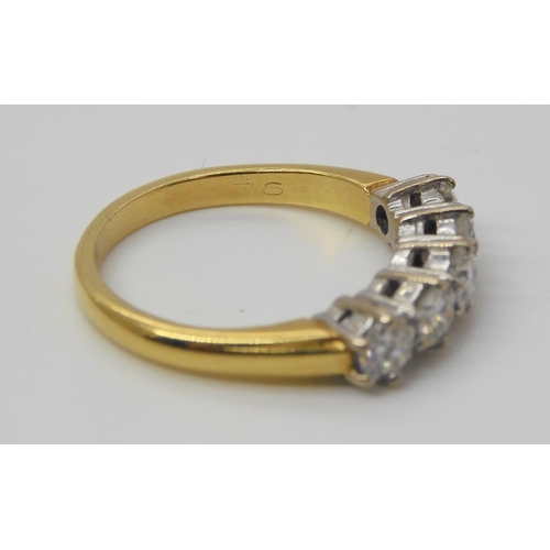 730 - An 18ct yellow and white gold five stone diamond ring set with estimated approx 0.75cts of brilliant... 