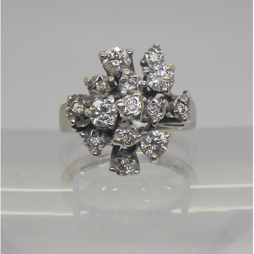 742 - A 9ct white gold diamond cluster ring, set with estimated approx 0.55cts of brilliant cut diamonds, ... 