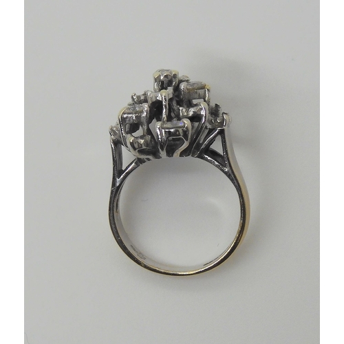 742 - A 9ct white gold diamond cluster ring, set with estimated approx 0.55cts of brilliant cut diamonds, ... 