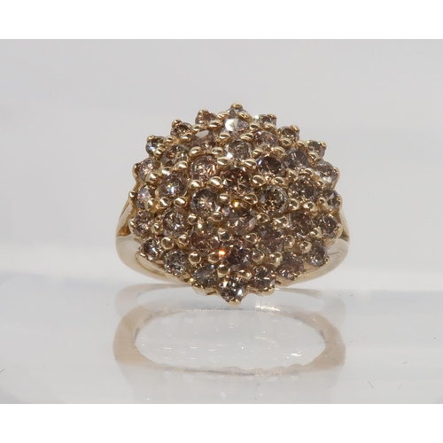744 - A 9ct yellow gold champagne diamond cluster ring, set with estimated approx 1.50cts of brilliant cut... 