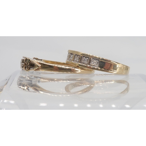 748 - A 9ct gold three stone eight cut diamond ring, in illusion star settings, set with estimated approx ... 
