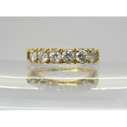 752 - An 18ct gold six stone diamond ring, set with estimated approx 1ct of brilliant cut diamonds, finger... 