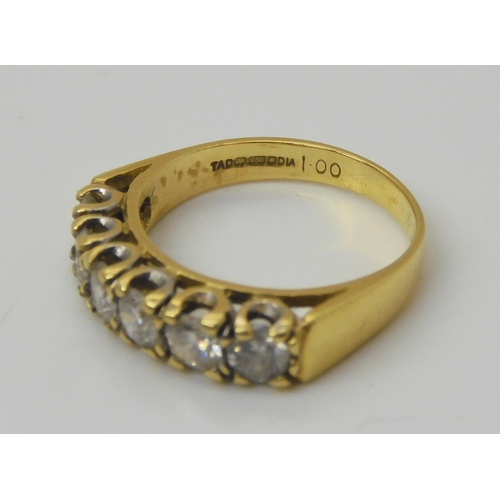 752 - An 18ct gold six stone diamond ring, set with estimated approx 1ct of brilliant cut diamonds, finger... 