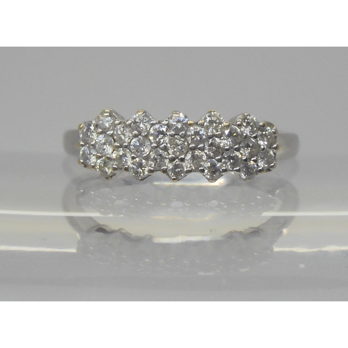 761 - A 9ct white gold diamond cluster ring, set with estimated approx 0.50cts of brilliant cut diamonds, ... 