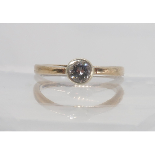 762 - A 9ct gold diamond solitaire ring set with an estimated approx 0.25cts brilliant cut diamond, finger... 