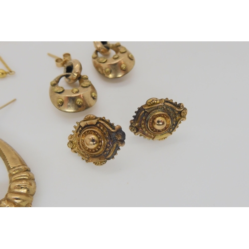 778 - Two pairs of 9ct gold earrings, and a further two pairs of yellow metal earrings, weight together 8.... 