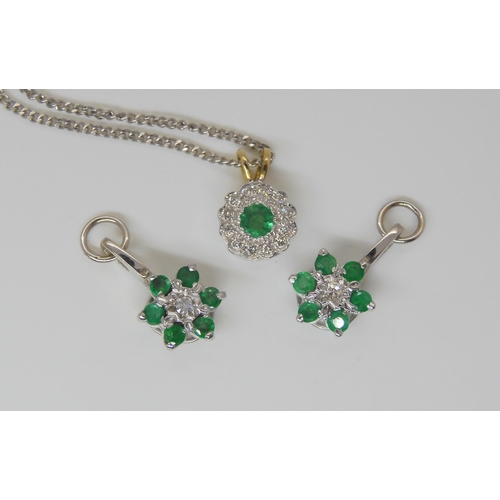 782 - An 18ct white and yellow gold emerald and diamond set pendant on 9ct white gold chain, together with... 