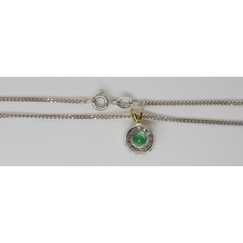 782 - An 18ct white and yellow gold emerald and diamond set pendant on 9ct white gold chain, together with... 