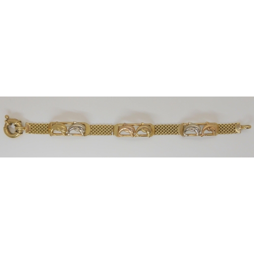 786 - A 9ct yellow gold bracelet with tri coloured gold dolphin links, 17.8gms