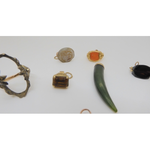 790 - A  15ct gold ring, a 9ct mounted smoky quartz fob, a greenstone tusk pendant, an 18ct diamond s... 