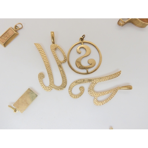 791 - Assorted letter pendants, crosses, other pendants, part rings etc, weight together, 31.3gms