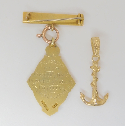 802 - A 14ct Glasgow and West of Scotland Master Plumbers Association medal, together with a yellow metal ... 