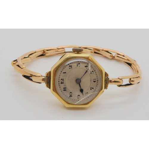 809 - A ladies 18ct gold watch head on 15ct gold expanding bracelet, 19.4gms