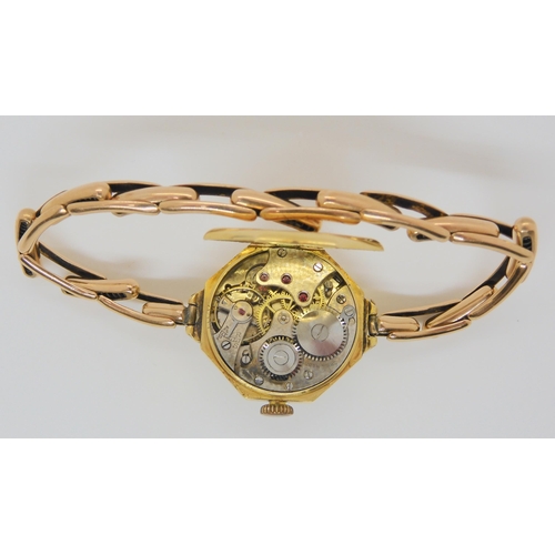 809 - A ladies 18ct gold watch head on 15ct gold expanding bracelet, 19.4gms