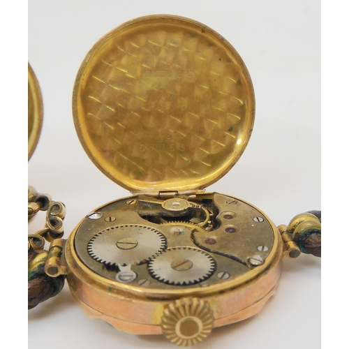 818 - An 18ct ladies watch head on rolled gold strap, a 9ct pocket watch, and five gold watch heads on rol... 