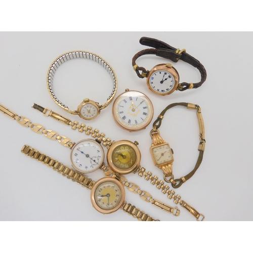 818 - An 18ct ladies watch head on rolled gold strap, a 9ct pocket watch, and five gold watch heads on rol... 