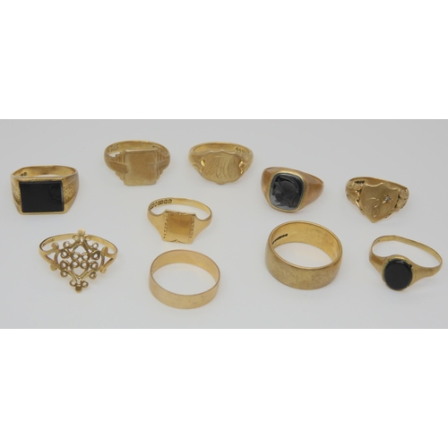 823 - Two 9ct gold wedding bands, a hematite centurion signet ring, two onyx set rings, and five other 9ct... 