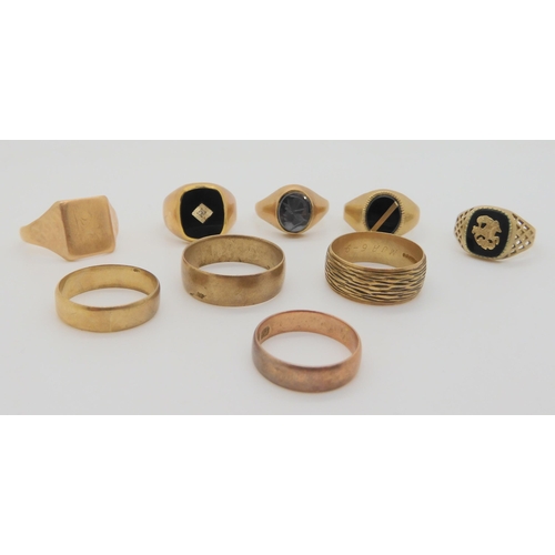 824 - Two 9ct wedding bands, another, a rose gold example and five assorted signet rings, weight toge... 