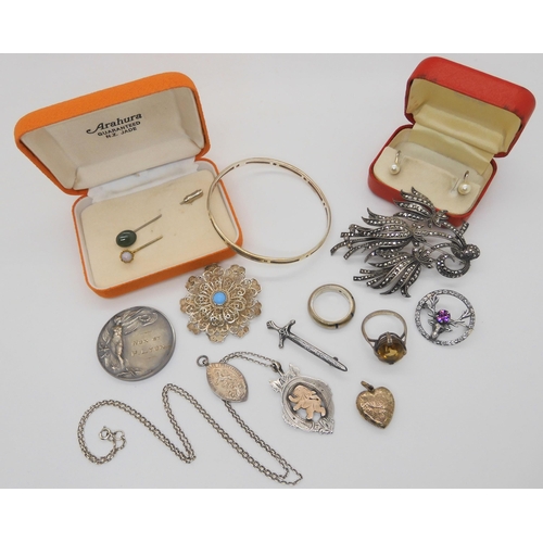 857 - Two silver chess medallions, a yellow metal heart shaped locket, a large marcasite brooch and other ... 