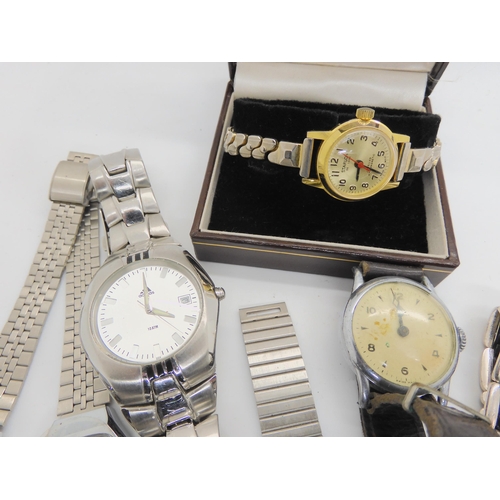 881 - A collection of fashion watches to include early digital examples