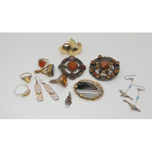 889 - Three Scottish agate brooches, a silver citrine ring stamped Iona and other items