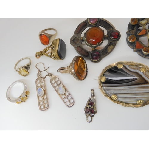 889 - Three Scottish agate brooches, a silver citrine ring stamped Iona and other items