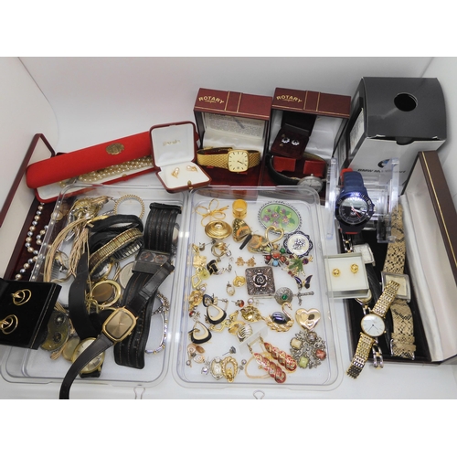 899C - A large collection of costume jewellery and watches to include a BMW ICE watch, in original packagin... 