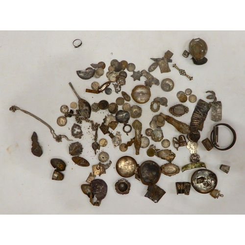 476A - Metal detecting finds, including a quantity of scrap silver (hallmarked fob medals, a graduated curb... 